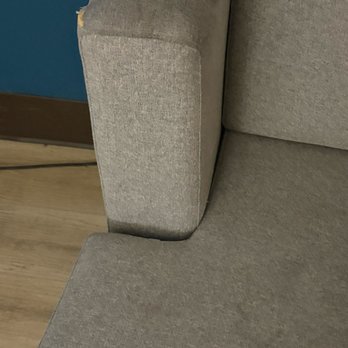 Quality Inn & Suites - A rip in the couch and stains all over it did not sit on the couch gross - Hotels Near Me - Bensalem, Pennsylvania