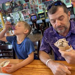 Sprinkle in time - Grandson and Poppy enjoying the ice cream .