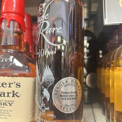 Olympic Liquor & Grocery - I never seen the liquor company post there store name on the bottle I love that whiskey