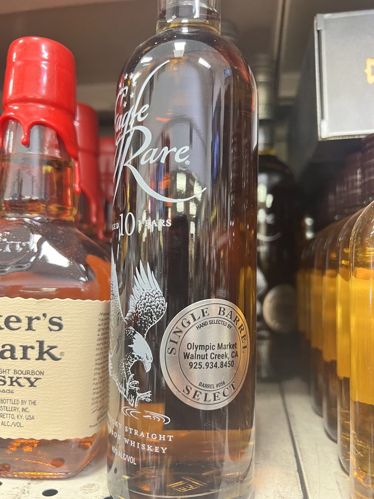 Olympic Liquor & Grocery Logo