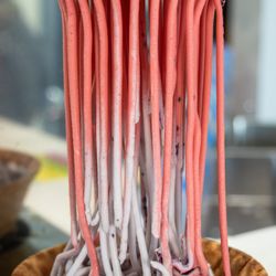 Spagato - Red Velvet and Blueberry Spaghetti Gelatopoured into a waffle bowl