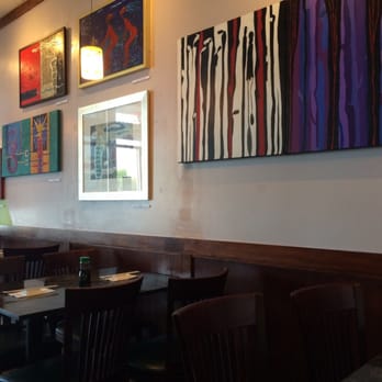 Sushi Kara - A lot of art work inside the restaurant. They have titles below each of them. - Asian Fusion Near Me - Long Beach, California