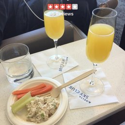 Chicken salad and mimosas before our flight. Chicken salad and mimosas before our flight.