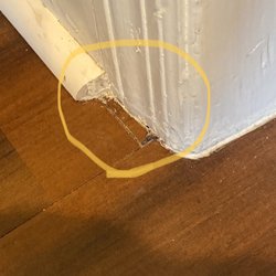 New Start Remodeling - Vendor stuck a cut and chipped piece of laminate in gaping hole as a quick fix instead of repairing properly.