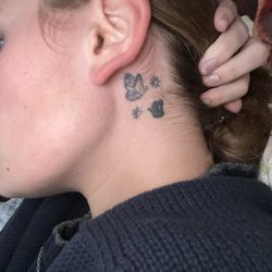 Alpha Tattoos and Piercings - An image of the tattoo. Uneven lines and thick ink in various places