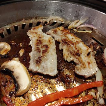 757 Korean BBQ - Pork belly sizzling away... Making me drool. - Korean Near Me - Virginia Beach, Virginia