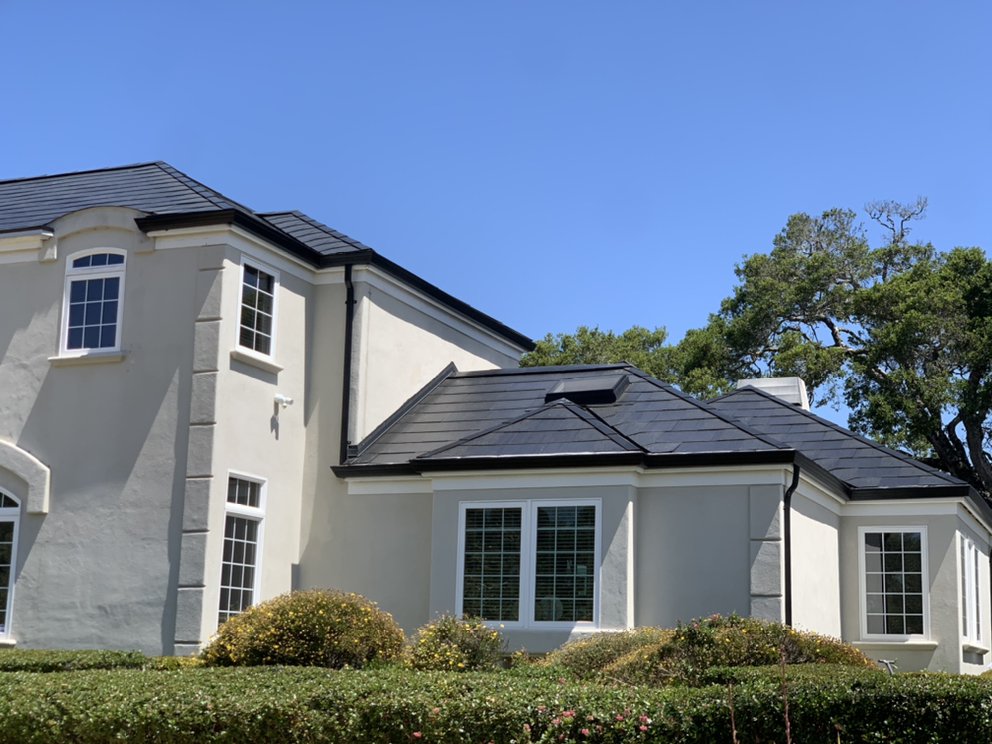 Slide of RidgeValley Roofing