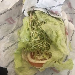 Jimmy John's - Unwich more like a salad thrown into parchment paper. Requested no tomato, there is clearly tomato's.