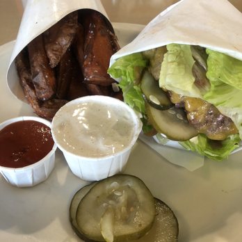 Moo Creamery - Lettuce-wrapped Moo Burger with sweet potato fries on the side - Burgers Near Me - Bakersfield, California Moo Creamery - Lettuce-wrapped Moo Burger with sweet potato fries on the side - Burgers Near Me - Bakersfield, California