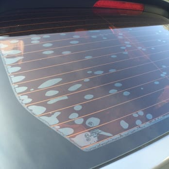 MADE IN THE SHADE WINDOW TINTING - Bubbles on tint. - Car Window Tinting Near Me - Cypress, California MADE IN THE SHADE WINDOW TINTING - Bubbles on tint. - Car Window Tinting Near Me - Cypress, California
