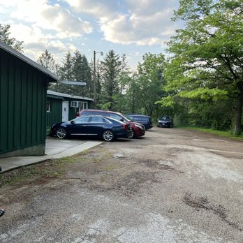 Hideaway Acres Supper Club - a woman walking in front of a garage - American Near Me - Benton, Wisconsin Hideaway Acres Supper Club - a woman walking in front of a garage - American Near Me - Benton, Wisconsin