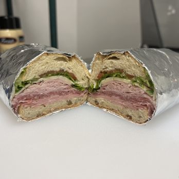 Il Taglio - THE ITALIANO. Genoa salami, ham, mortadella, and provolone topped with lettuce, tomato, Italian dressing. - Salad Near Me - Fort Lauderdale, Florida Il Taglio - THE ITALIANO. Genoa salami, ham, mortadella, and provolone topped with lettuce, tomato, Italian dressing. - Salad Near Me - Fort Lauderdale, Florida