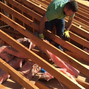 AAA Apex Construction - a man working on a roof - General Contractors Near Me - Garfield, New Jersey
