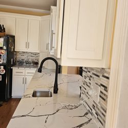 On Time Kitchen - New backsplash, extended Island, quartz counters!