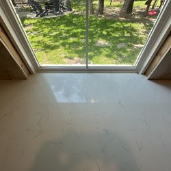 DallaStone Quartz Masters - Notched out the window by hand on site.
