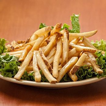 Carlee's Bar & Grill - a plate of french fries - Dive Bars Near Me - Pewaukee, Wisconsin