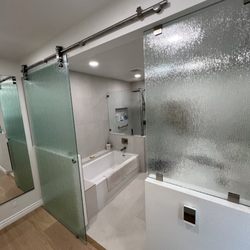 Pristine Glass Works - #framelessmirror #sliding door #rainglass
