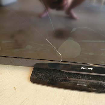 Quick and Careful Moving - Crack in screen and bubbling around it. - Movers Near Me - Grand Rapids, Michigan Quick and Careful Moving - Crack in screen and bubbling around it. - Movers Near Me - Grand Rapids, Michigan