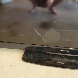 Quick and Careful Moving - Crack in screen and bubbling around it.