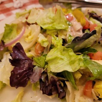 Buca di Beppo Italian Restaurant - Simple green salad is huge / dressing already added unless you ask for it on the side. - Italian Near Me - Universal City, California