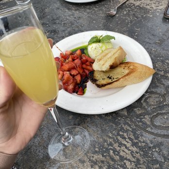 A'Bouzy - Pineapple mimosa and this strawberry burrata appetizer - Champagne Bars Near Me - Houston, Texas A'Bouzy - Pineapple mimosa and this strawberry burrata appetizer - Champagne Bars Near Me - Houston, Texas