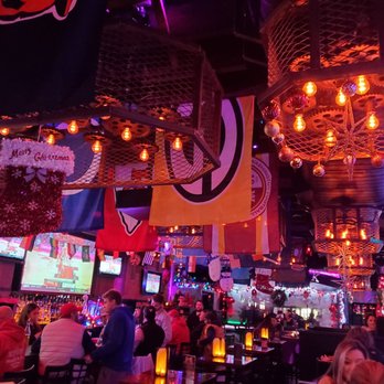 1 Republik - people sitting at a bar - Sports Bars Near Me - North Arlington, New Jersey