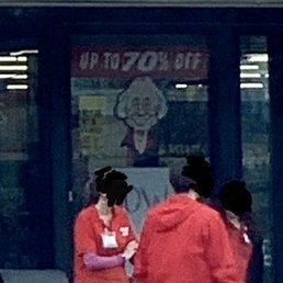 Employees providing a smoke screen at the front door.
