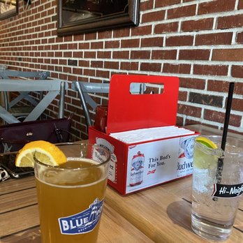 Portside Bar & Grill - a glass of beer with a slice of lemon - American Near Me - Port Jefferson, New York Portside Bar & Grill - a glass of beer with a slice of lemon - American Near Me - Port Jefferson, New York