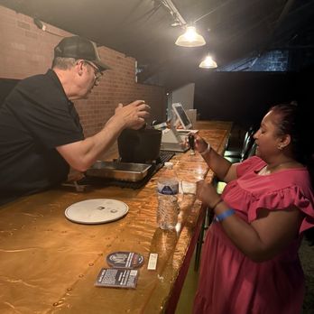 Prohibition Craft Spirits - Dipping it in wax - Distilleries Near Me - Louisville, Kentucky Prohibition Craft Spirits - Dipping it in wax - Distilleries Near Me - Louisville, Kentucky