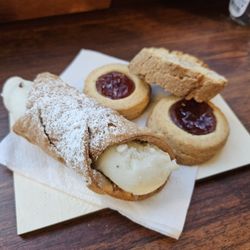 Unnamed Cafe - Cannoli, almond dessert, and cookies - complementary from the owners for providing feedback on their drinks!