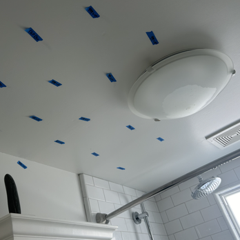 Fog City Roofing - My bathroom, with locations of water marked by someone I had to hire. - Roofing Near Me - Alameda, California