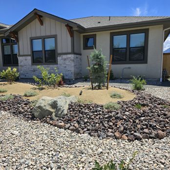 Tom Ediss Landscape - The designer suggested creating mounds and adding over a dozen airport boulders. - Landscaping Near Me - Carson City, Nevada Tom Ediss Landscape - The designer suggested creating mounds and adding over a dozen airport boulders. - Landscaping Near Me - Carson City, Nevada