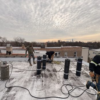 Encore Roofing and Masonry - 5mil G.A.F modified bitumen ultra white Re-Roof - Roofing Near Me - Chicago, Illinois Encore Roofing and Masonry - 5mil G.A.F modified bitumen ultra white Re-Roof - Roofing Near Me - Chicago, Illinois