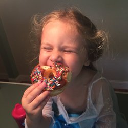 King Donuts - Lennox sure enjoyed the chocolate sprinkle donut.