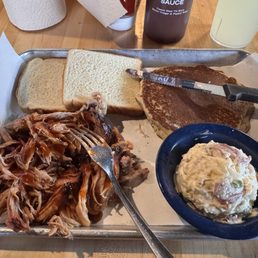 Pork shoulder tray with potato salad and cornbread hoecake Pork shoulder tray with potato salad and cornbread hoecake