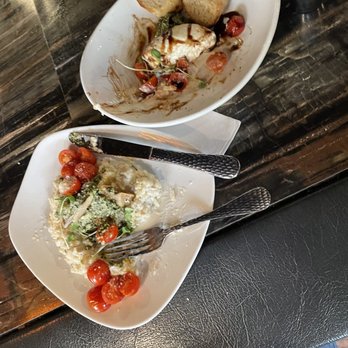 740 Social - two plates of food on a table - Italian Near Me - Marietta, Ohio 740 Social - two plates of food on a table - Italian Near Me - Marietta, Ohio