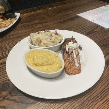 Local Goat - Flame-Grilled Salmon* with Stone Ground Cheese Grits - New American Near Me - Pigeon Forge, Tennessee