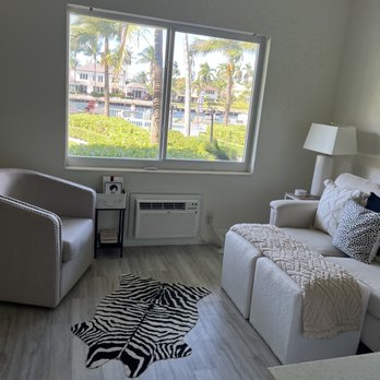 Royal Colonial Apartments - Living room with unprecedented view - Apartments Near Me - Boca Raton, Florida Royal Colonial Apartments - Living room with unprecedented view - Apartments Near Me - Boca Raton, Florida