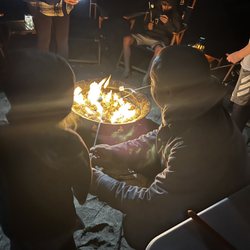 The Beach Genie - Relaxing by the bon fire.