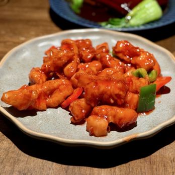 Antidote - Gulu Chicken - white chicken meat, served with bell and green peppers, pineapple, and a sweet and sour sauce - Cocktail Bars Near Me - Brooklyn, New York