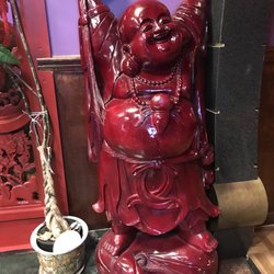 Rub the tummy for luck!