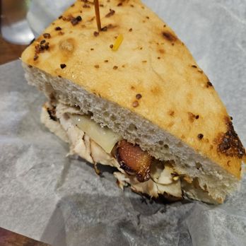 Bix - a chicken sandwich on a piece of wax paper - Sports Bars Near Me - West Des Moines, Iowa Bix - a chicken sandwich on a piece of wax paper - Sports Bars Near Me - West Des Moines, Iowa