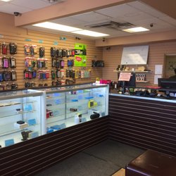 World of Wireless - Interior of shop. Nice people, chairs for waiting, fast service.
