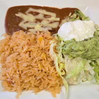 Cinco de Mayo - Fajitas condiments with rice - Mexican Near Me - St. Cloud, Minnesota Cinco de Mayo - Fajitas condiments with rice - Mexican Near Me - St. Cloud, Minnesota