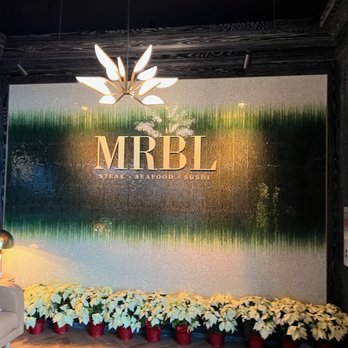 MRBL - The entrance area is warm and inviting - Steakhouses Near Me - Bellevue, Kentucky MRBL - The entrance area is warm and inviting - Steakhouses Near Me - Bellevue, Kentucky
