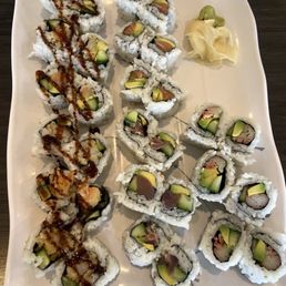 4 different rolls here: tempura, salmon, tuna, shrimp crunch etc
