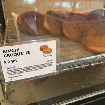 Tous Les Jours - Kimchi Croquette indicated w.black sesame seeds on top - Bakeries Near Me - Dublin, California