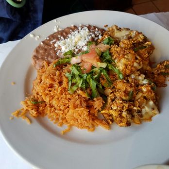 Ricano's Restaurant - Chorizo Rito breakfast - American Near Me - Chicago, Illinois Ricano's Restaurant - Chorizo Rito breakfast - American Near Me - Chicago, Illinois
