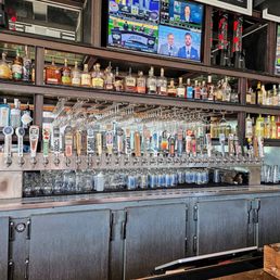a bar with a variety of liquors a bar with a variety of liquors