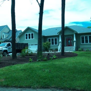 Atlantic Coast Landscape Company - a truck parked in front of a house - Landscaping Near Me - New Bern, North Carolina Atlantic Coast Landscape Company - a truck parked in front of a house - Landscaping Near Me - New Bern, North Carolina